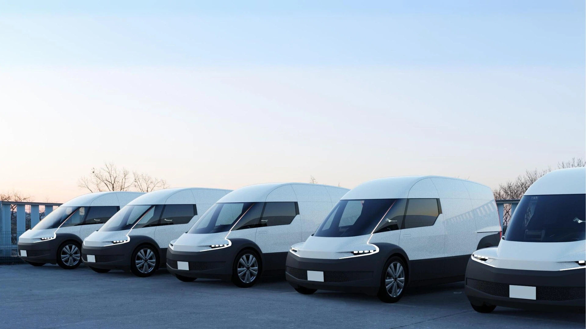 A row of Indigo Flow Cargo light electric vehicles parked in a lot, designed for last-mile delivery solutions